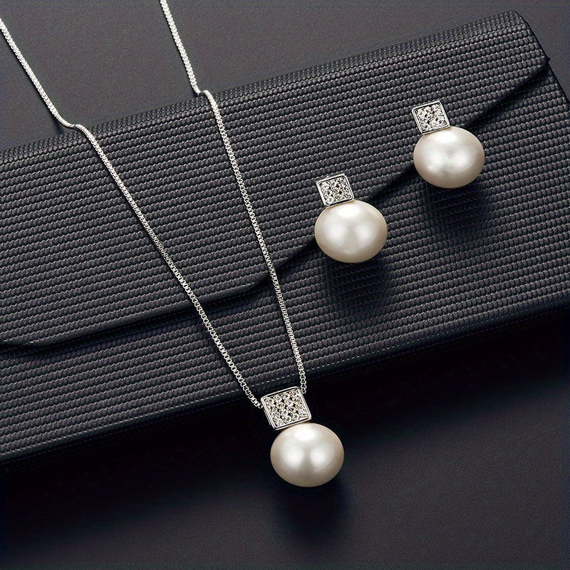 Silver and Pearl Necklace And Earring Set
