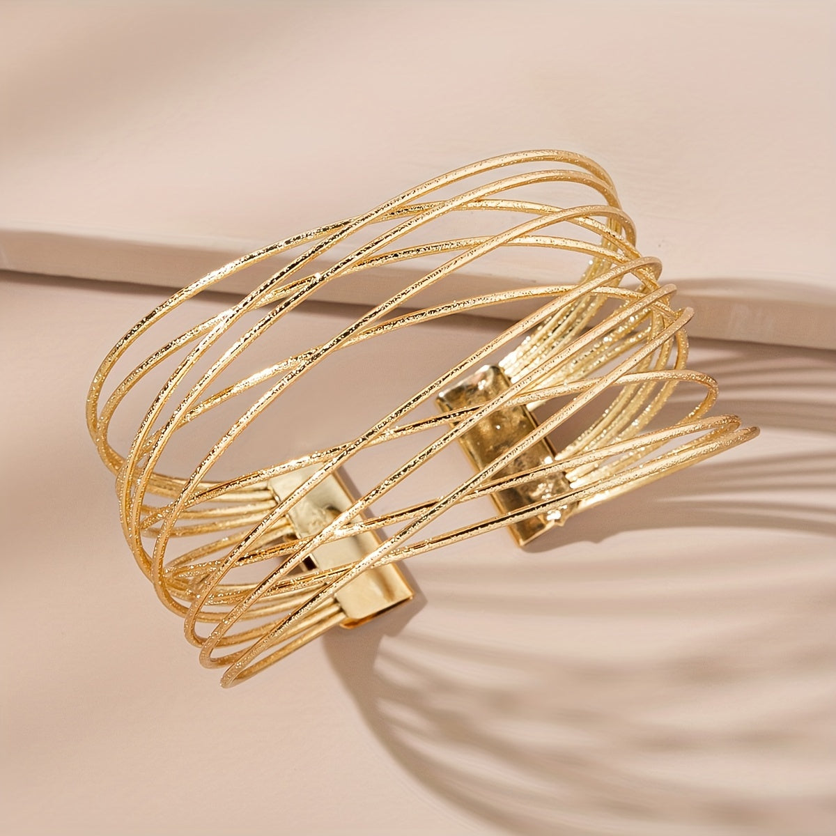 Golden Twisted Cuff Bangle