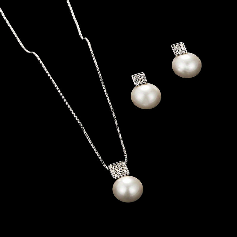 Silver and Pearl Necklace And Earring Set