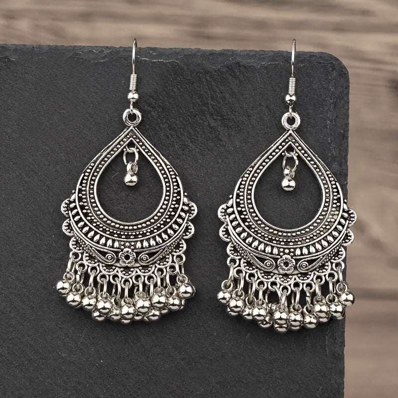 Ethnic Carved Tassel Earrings