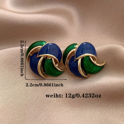Windmill Design Peacock Clip-On Earrings