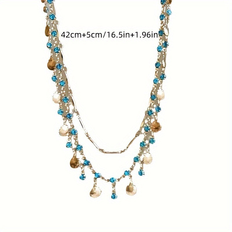 2 piece Blue Zircon and Golden Shells