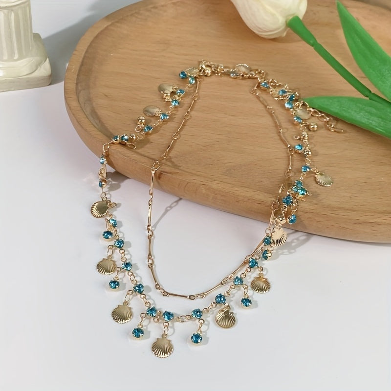 2 piece Blue Zircon and Golden Shells