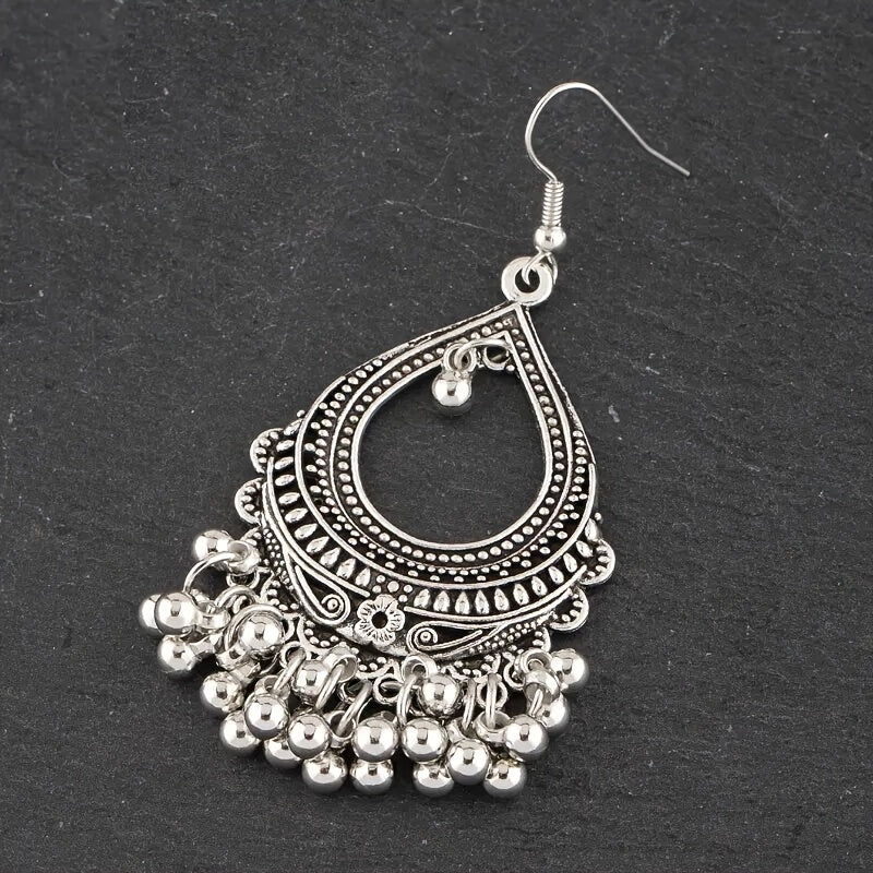 Ethnic Carved Tassel Earrings